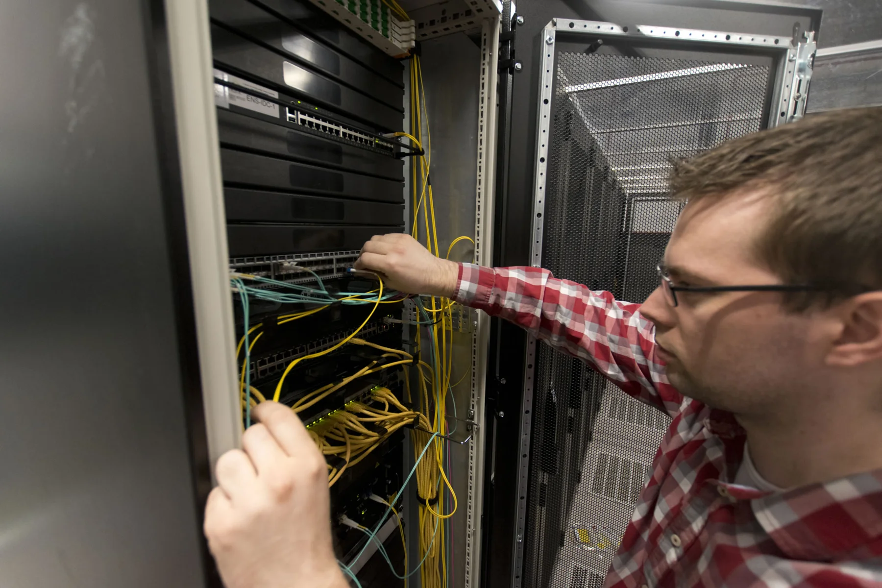 A colleague working on the fibre infrastructure